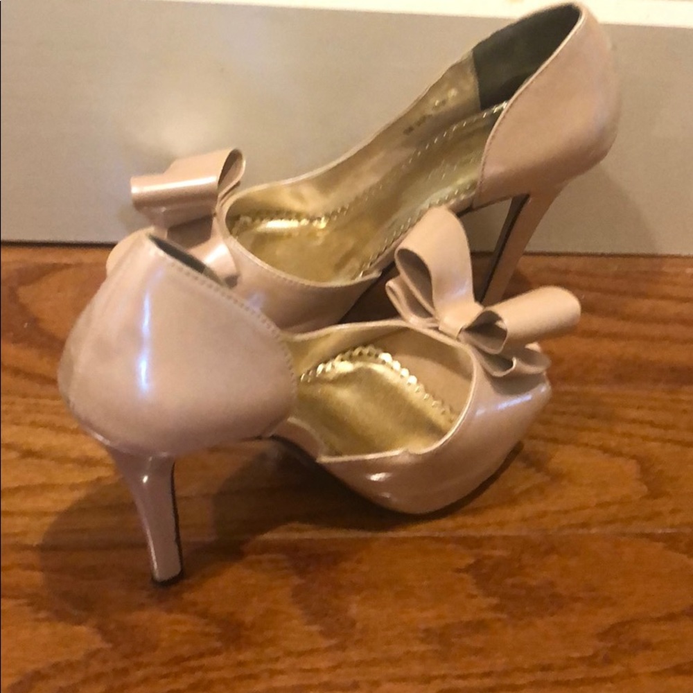 Johnathan Kayne heels in pink patent leather.